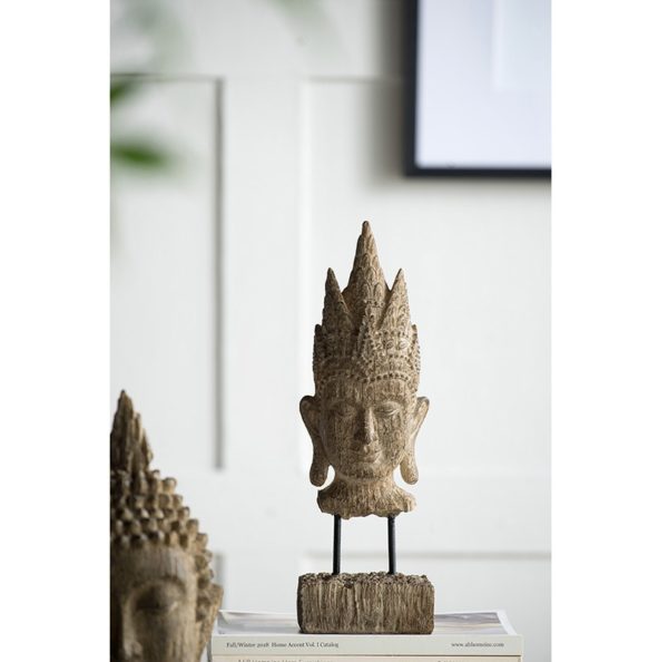ראש בודהה על סטנד דמוי עץ